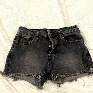 Button-fly black jean shorts, frayed and stretchy, petite 27
